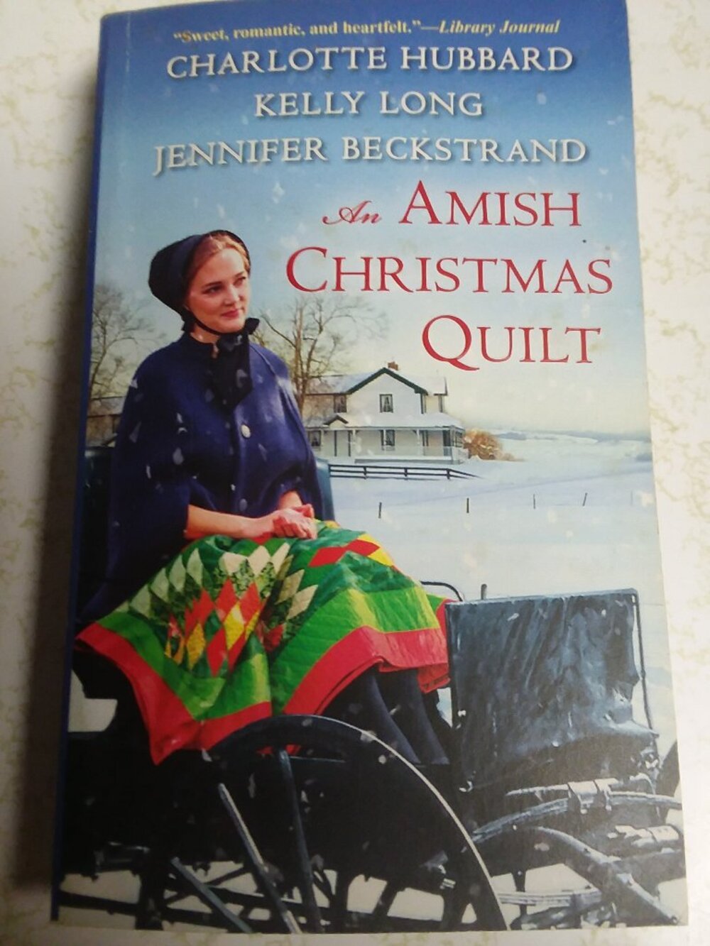 An Amish Christmas Quilt Paperback Book by Charlotte Hubbard